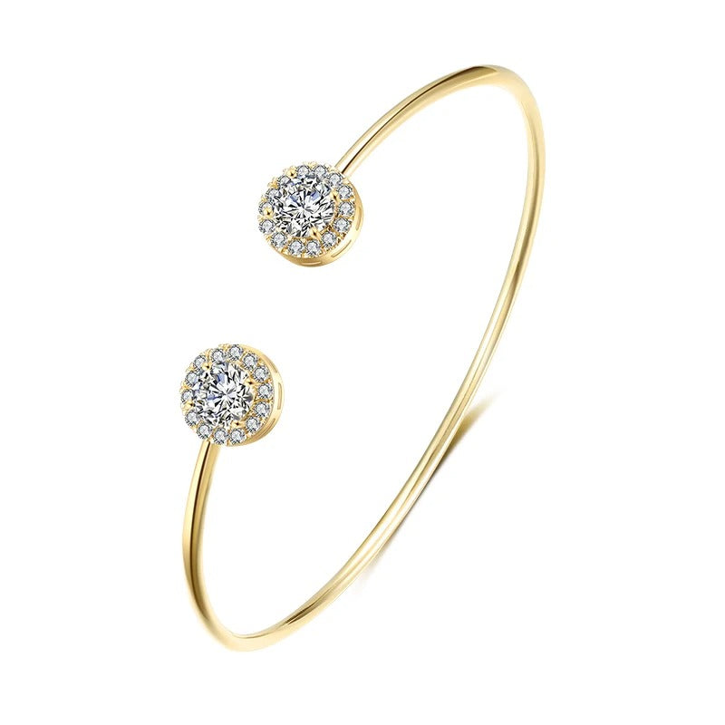 LUXÉA Cuff – Geometrischer Zirkonia-Armreif in Goldoptik
