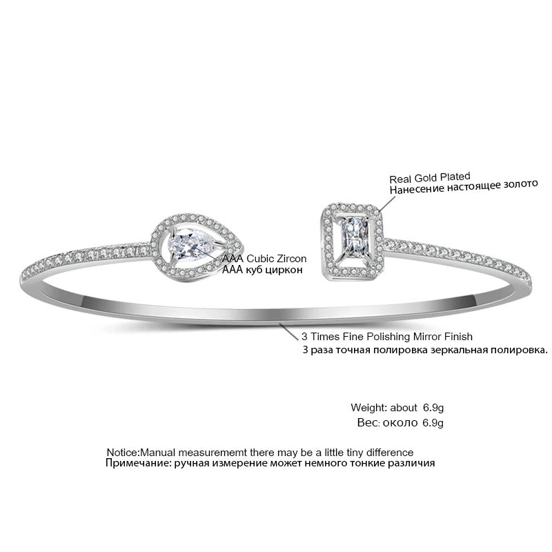 LUXÉA Cuff – Geometrischer Zirkonia-Armreif in Goldoptik